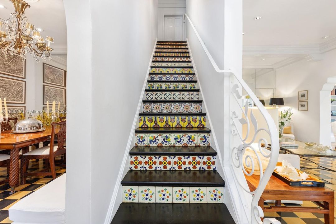 Whimsical hand painted Spanish tiled staircase
