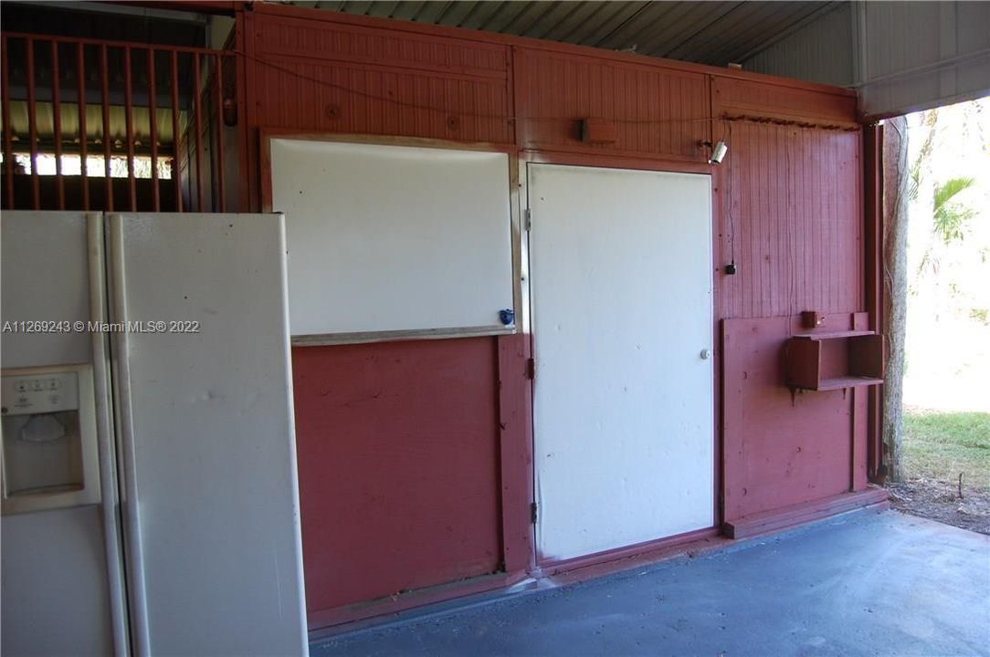 TACK ROOM door with keyed entry & SECURITY CAMEA