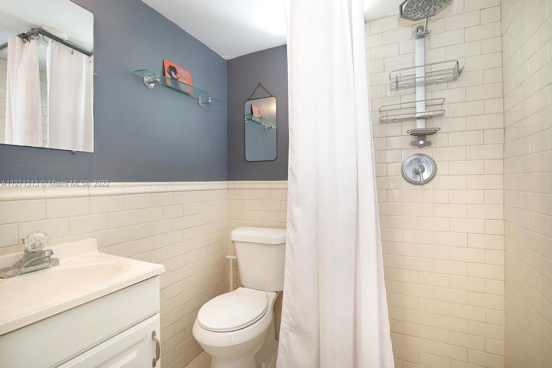 Full 3rd bathroom in detached laundry room.