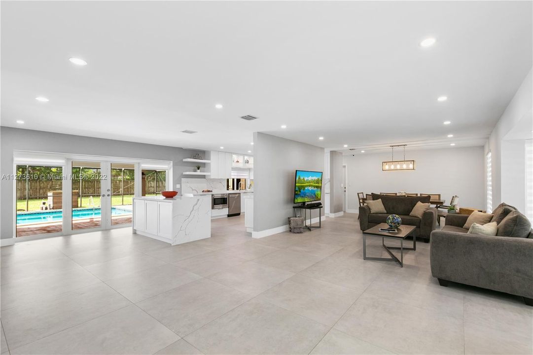 open concept,  new tiled floor throughout