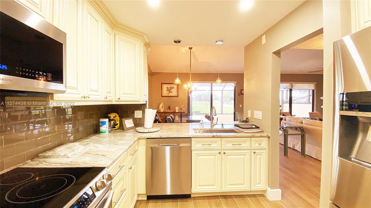 updated kitchen with granite countertop