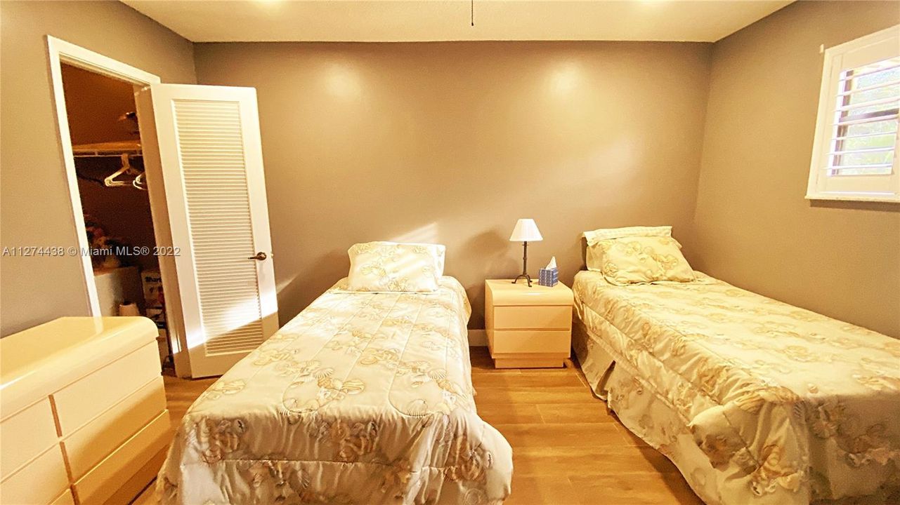 upstairs second bedroom with two twin beds