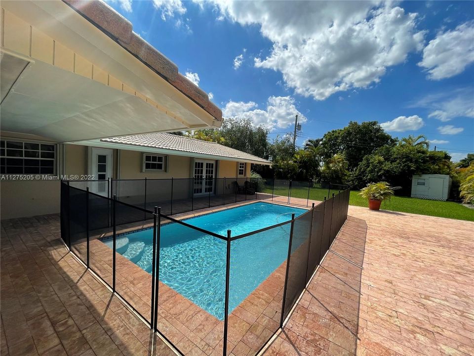 Huge large entertaining Area/ Pool Area with Direct access to the front and Parking