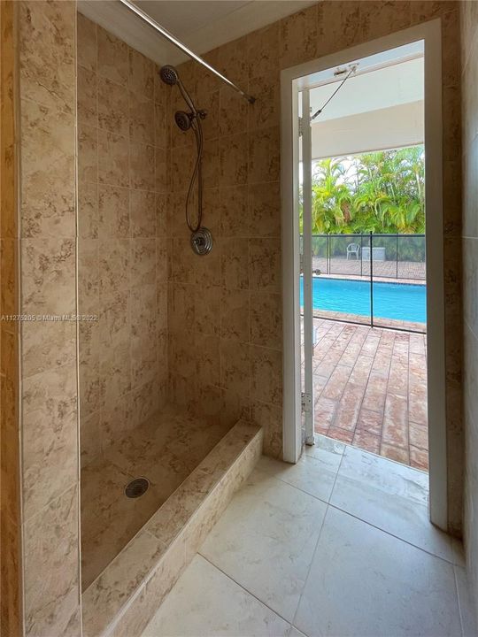 2nd Full Bathroom and with access to/from the Pool for convenience when entertaining in the Pool area