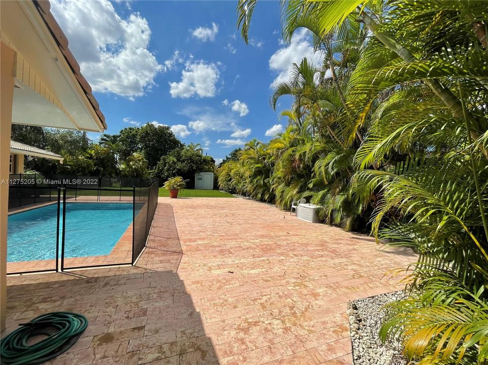 Huge large entertaining Area/ Pool Area with Direct access to the front and Parking