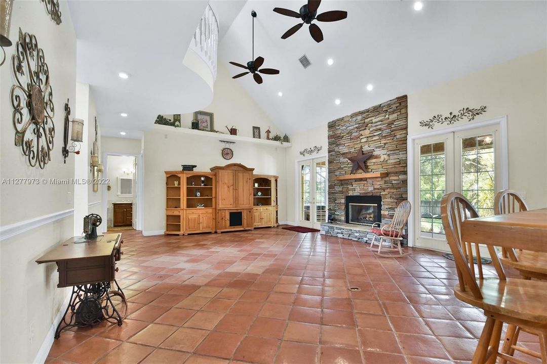 Family room with Wood Buring fireplace.