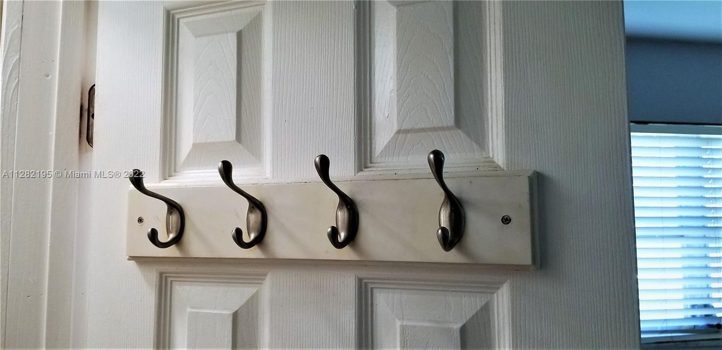 Hooks in primary bath for comfy towels and robes