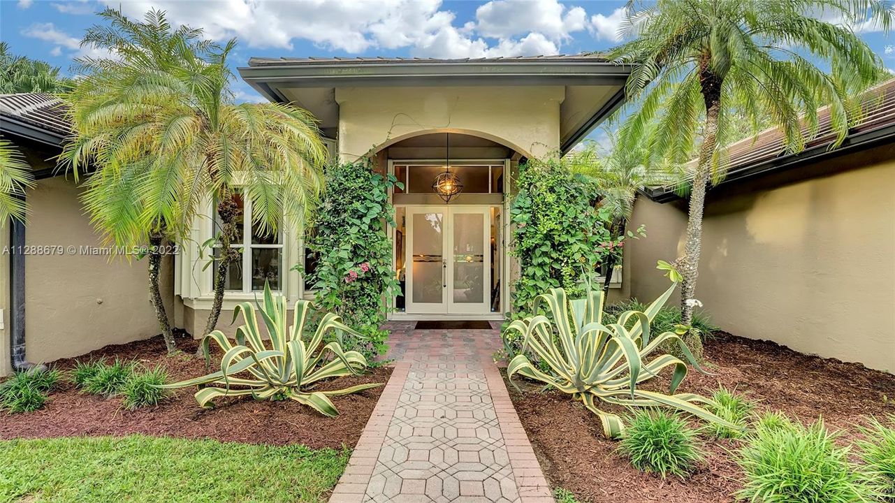 Outdoor welcoming area with arched entrance