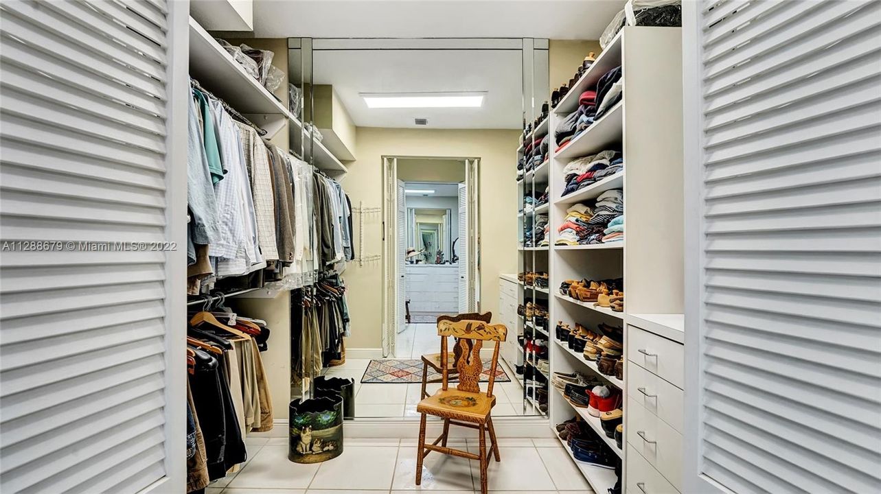 Two separate and oversized master closets