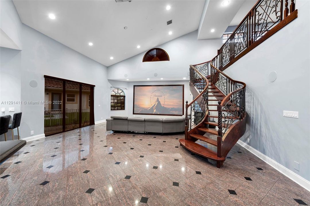 massive family room with projector television that stays.