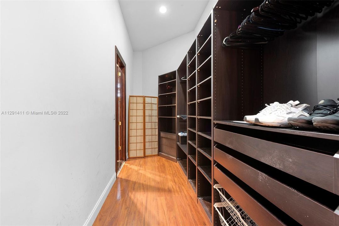 The second closet in the master bedroomhis/hers