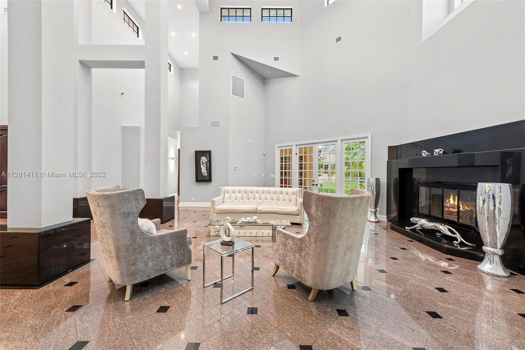 Great room leads to multiple wings of the home