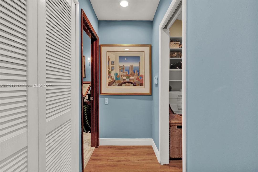 Hallway leading to the master bathroom and closet