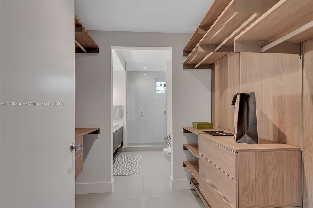 generous sized walk-in closet to house your Design District purchases