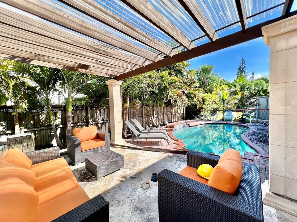 backyard with undamaged pool