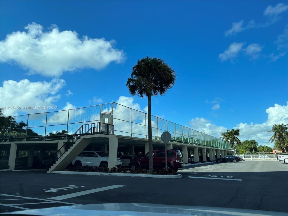 Tennis above covered parking