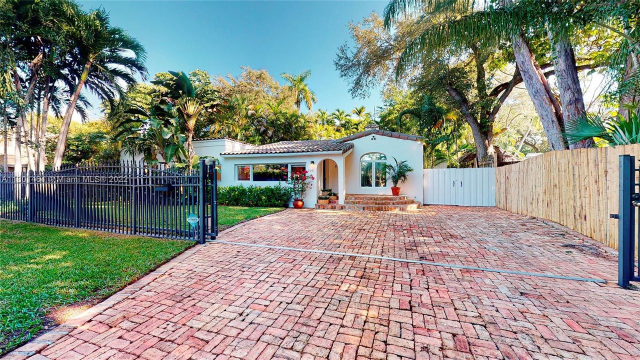 brick pavers, gated to front of house.