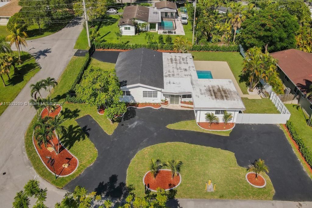 Aerial view of this spacious corner home