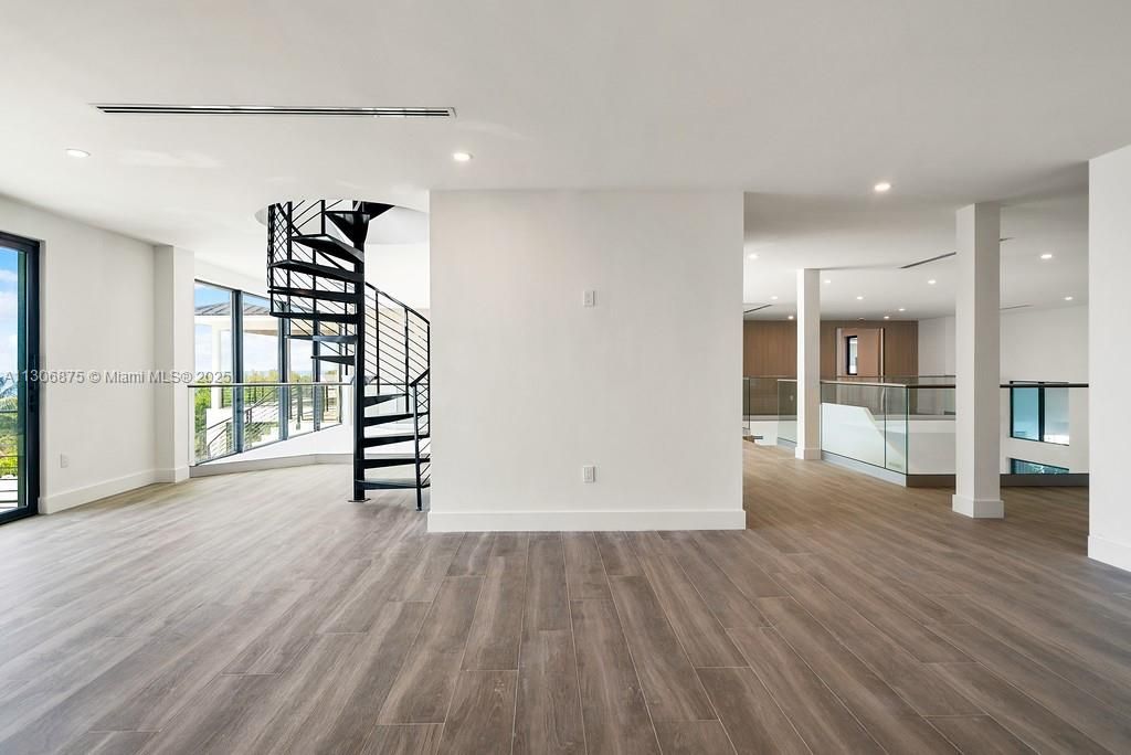 2nd Floor Living with Spiral Staircase to 3rd Floor