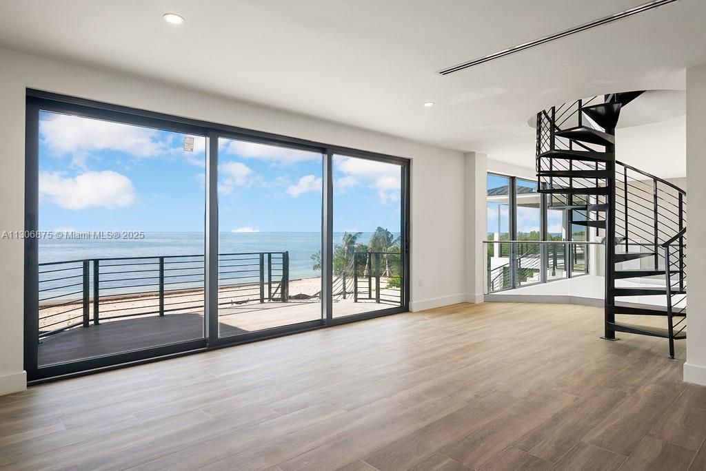 2nd Floor Living with Spiral Staircase to 3rd Floor