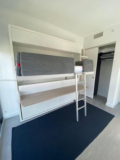 2nd bedroom bunk beds can be easily transformed into a single bed + work desk