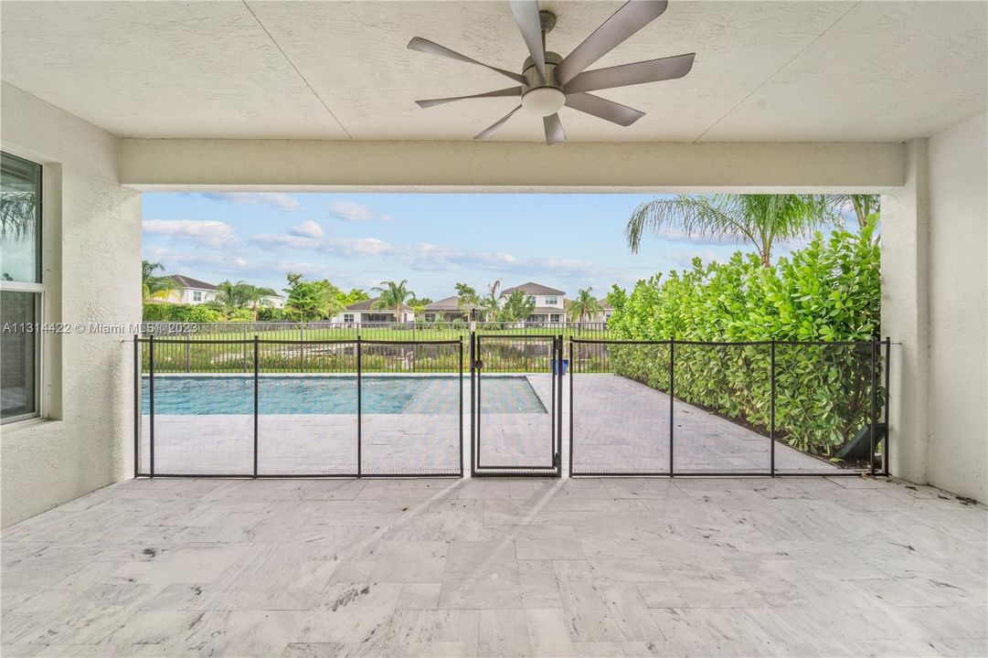 Fenced covered patio area