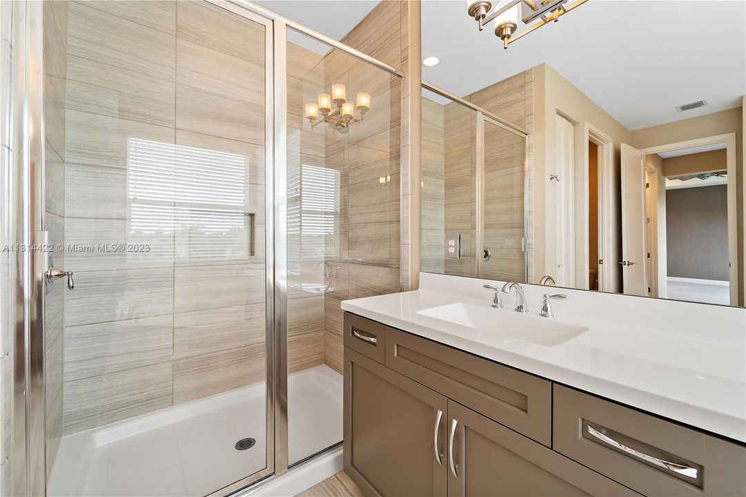 Separate tub & shower in Owner's suite