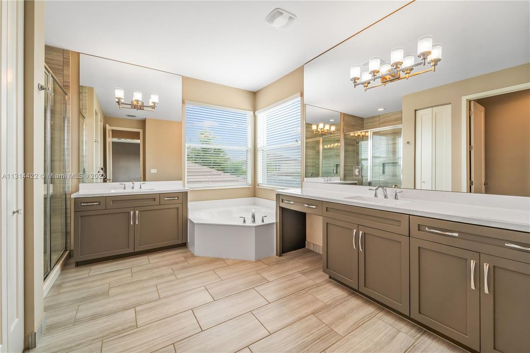 Separate tub & shower in Owner's suite