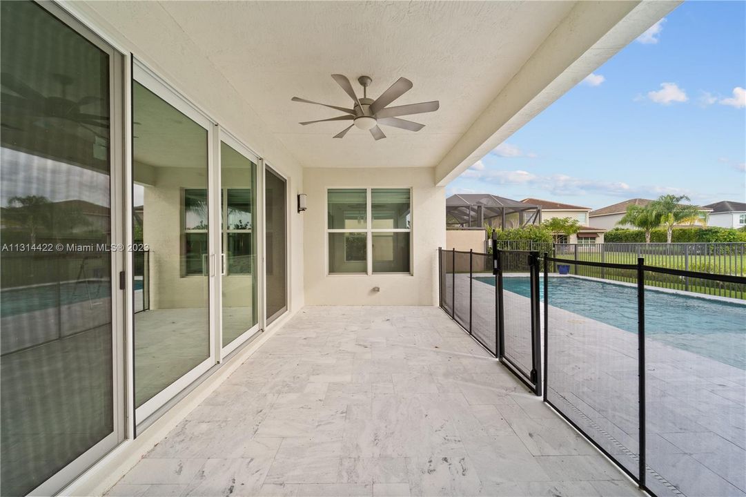 Fenced covered patio area