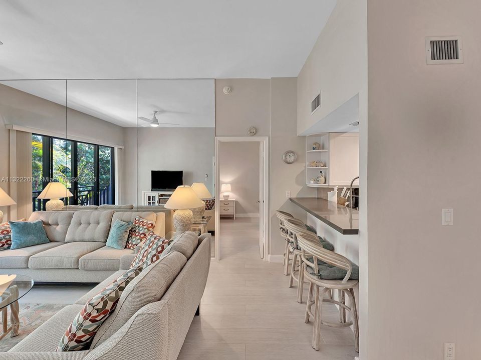 family room and counter seating for kitchen