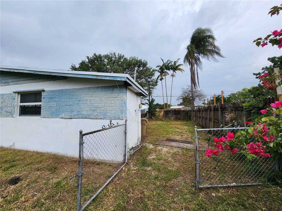 Front Side of House/Back Yard Entrance Gate