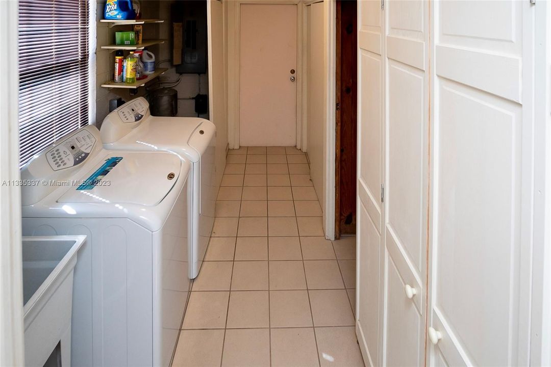 Laundry area with built in storage