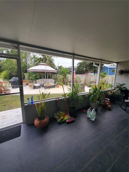 View from covered patio to outide Gazebo