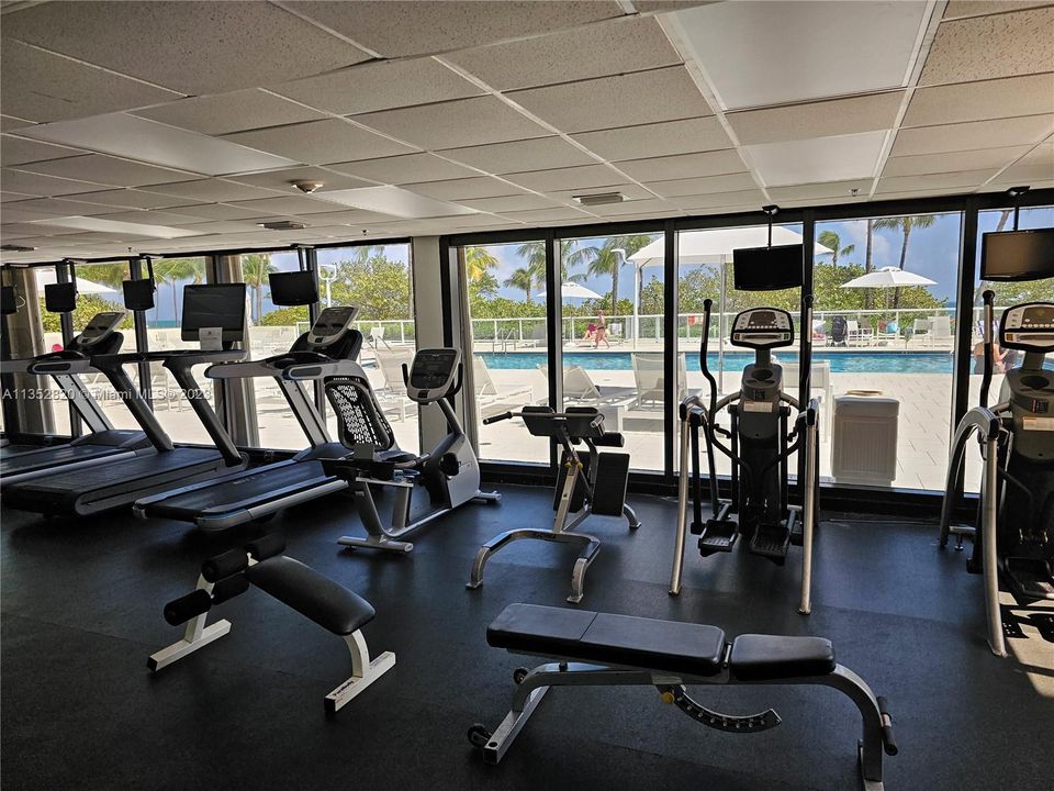 Gym with view to the pool