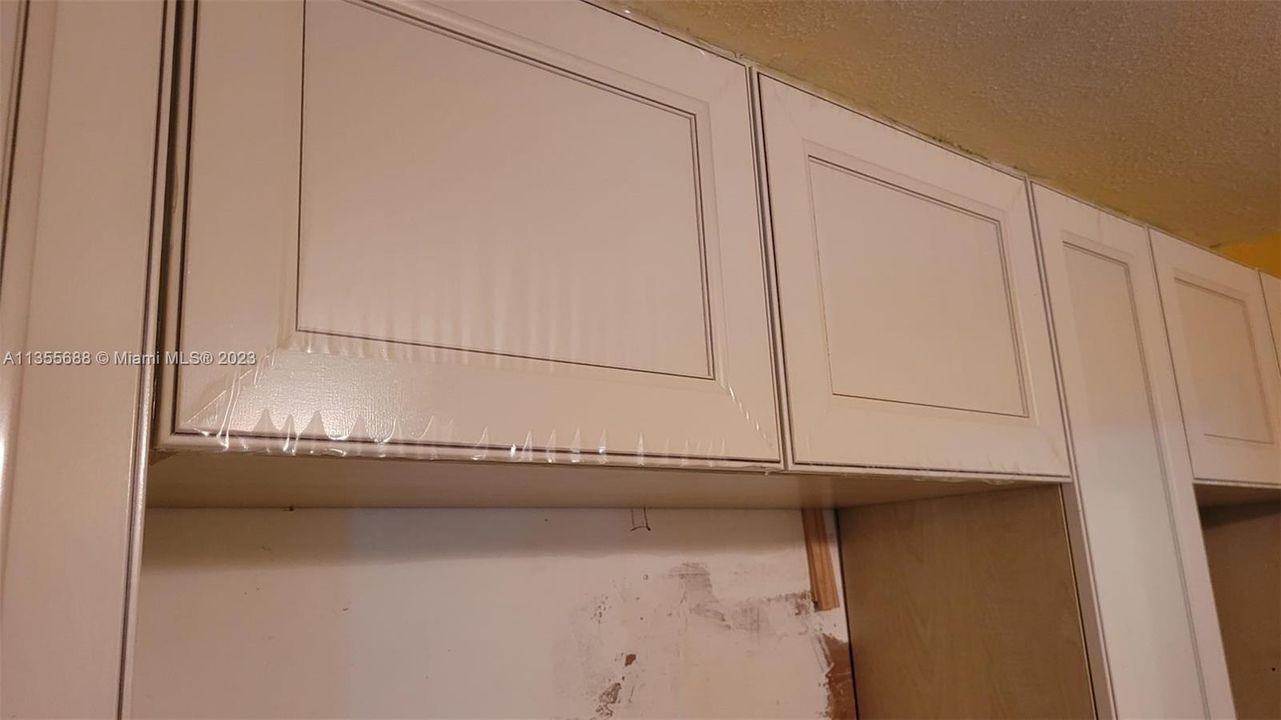 New cabinets with plastic covers