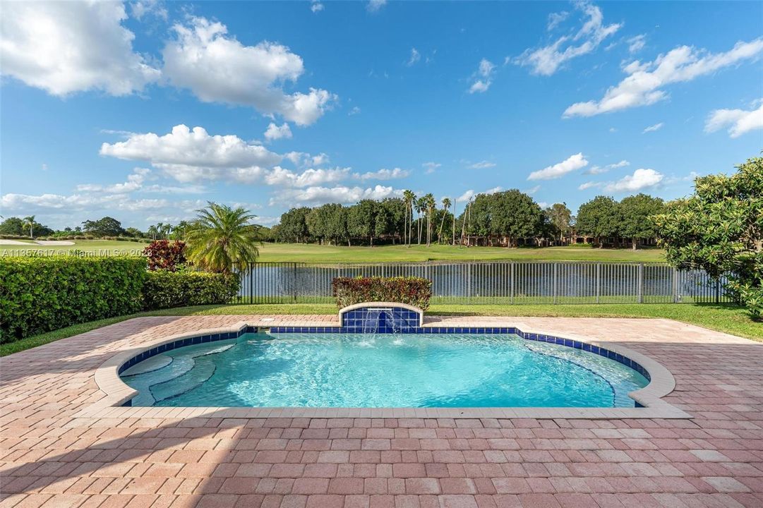 Amazing pool , fenced patio with stunning views to the lake and golf.