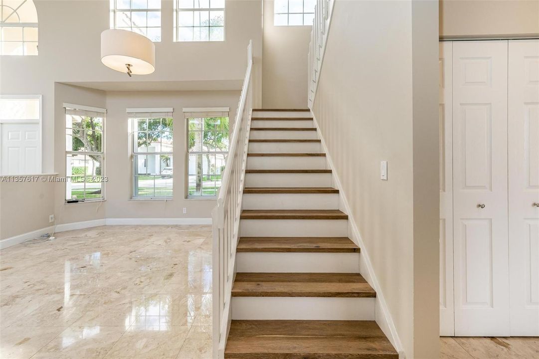 All the bedrooms and stairs have wood floors.