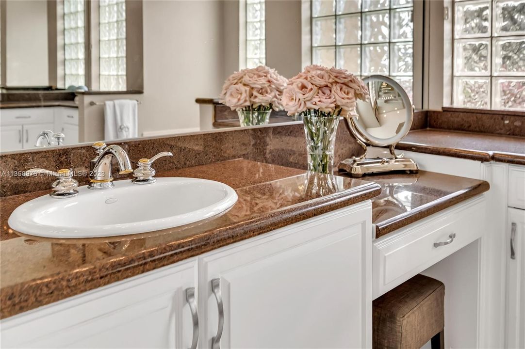 Two vanities and sinks in the primary bathroom