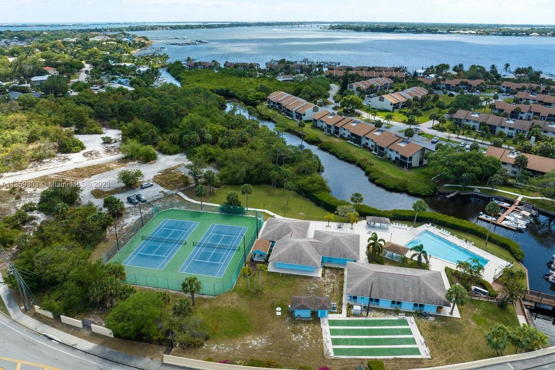 Larger pool, clubhouse tennis & shuffleboard courts