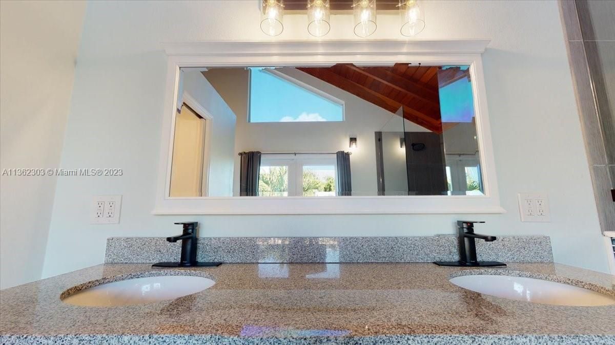 Custom coastal glass tiles and glass enclosure