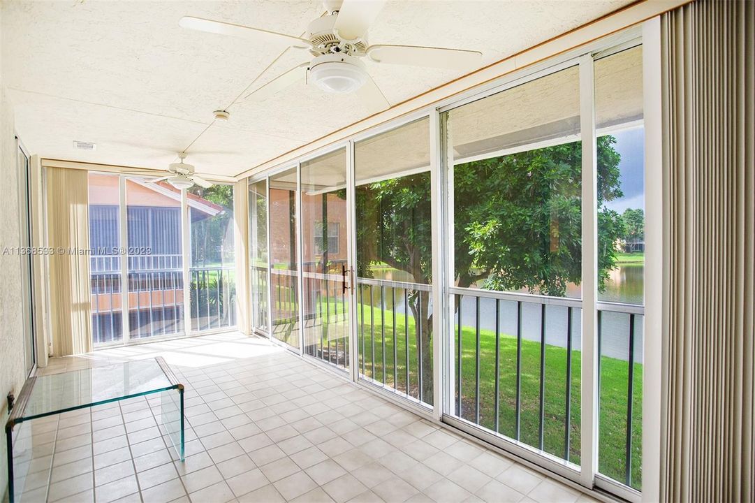 Glass Enclosed Lanai under Air/3rd bedroom