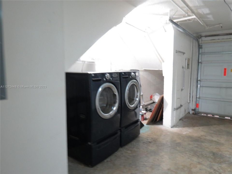 Upgraded washer and dryer in garage.