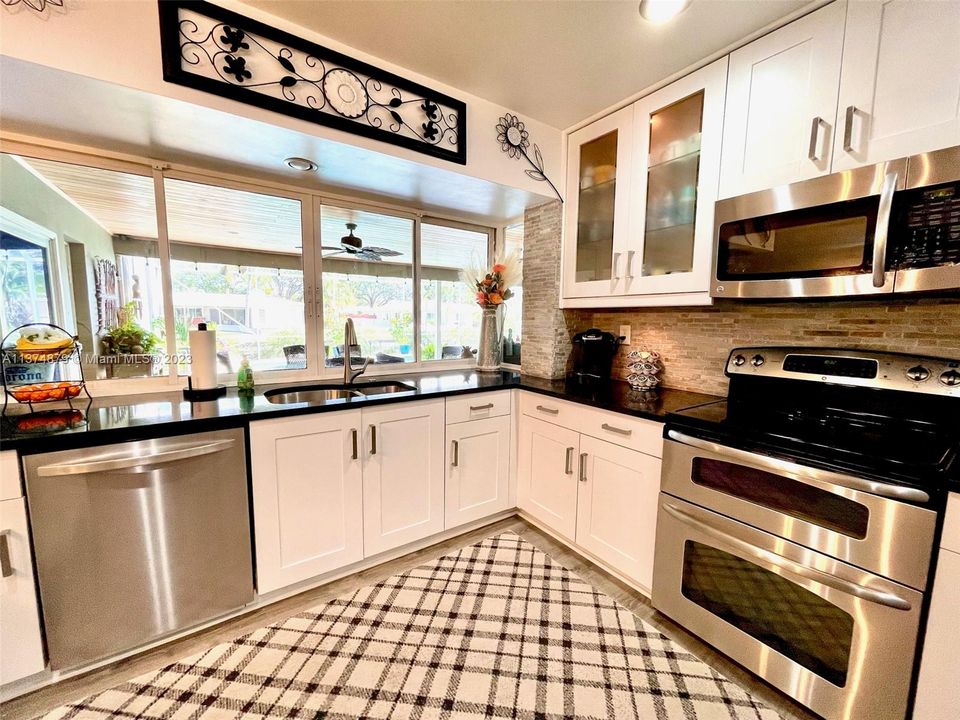 Soft close doors, granite counters, double oven