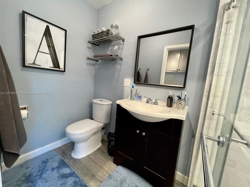 3rd bath with easy access to 3 bedroom and side patio.