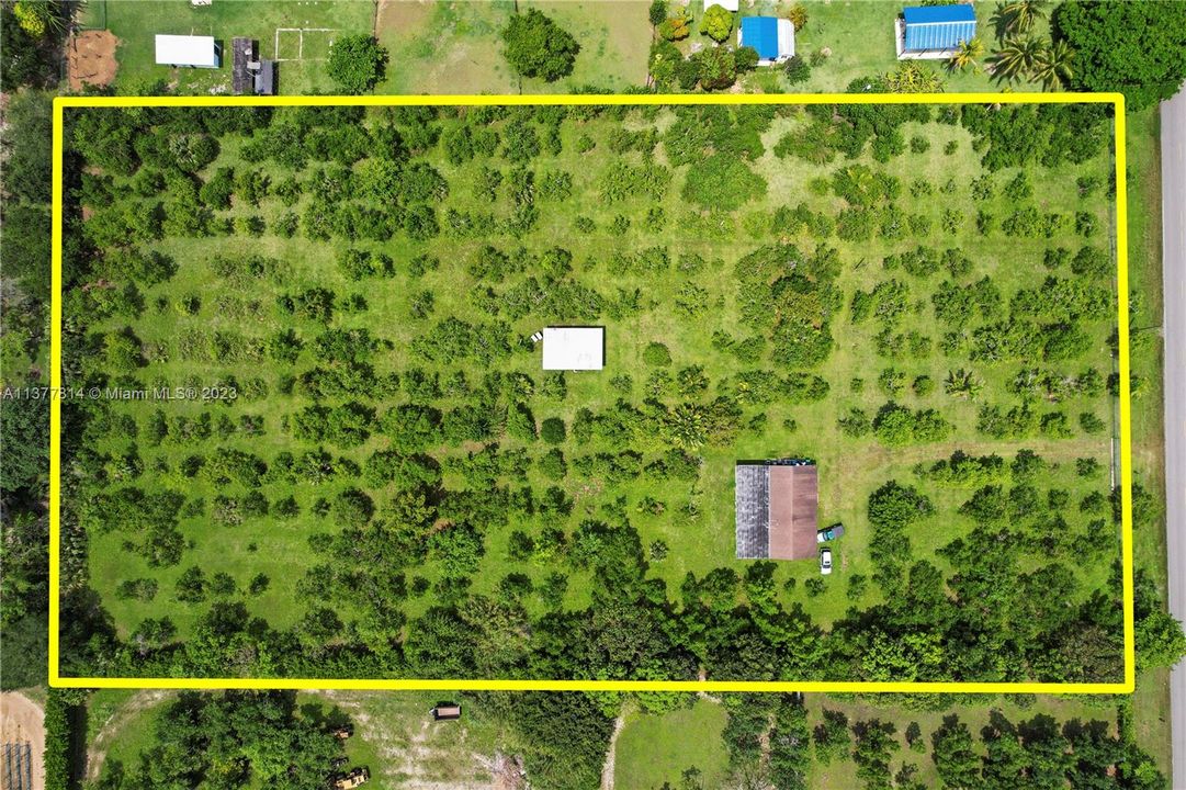 5 acres avocado grove, diesel irrigation and a 3/2 home in prime redland on sw 248 st. great land usage with the home closer to front  and side leaving max land use avail..