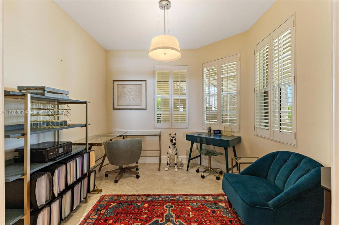 This Den/Office space can be used as a guest bedroom (with two pocket doors for privacy).