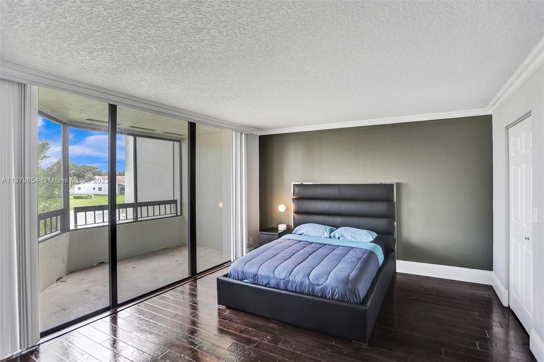 Upstairs bedroom with balcony