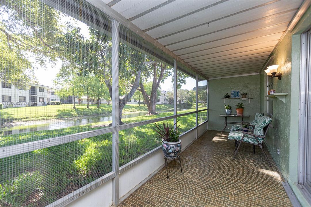 ENCLOSED PATIO WITH VIEW OF THE CANAL