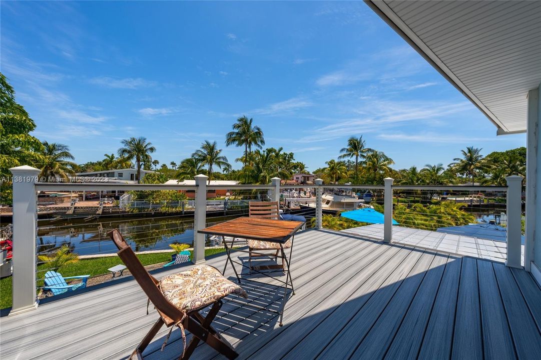 Roof top entertainment deck off the 3rd bedroom overlooking the water.