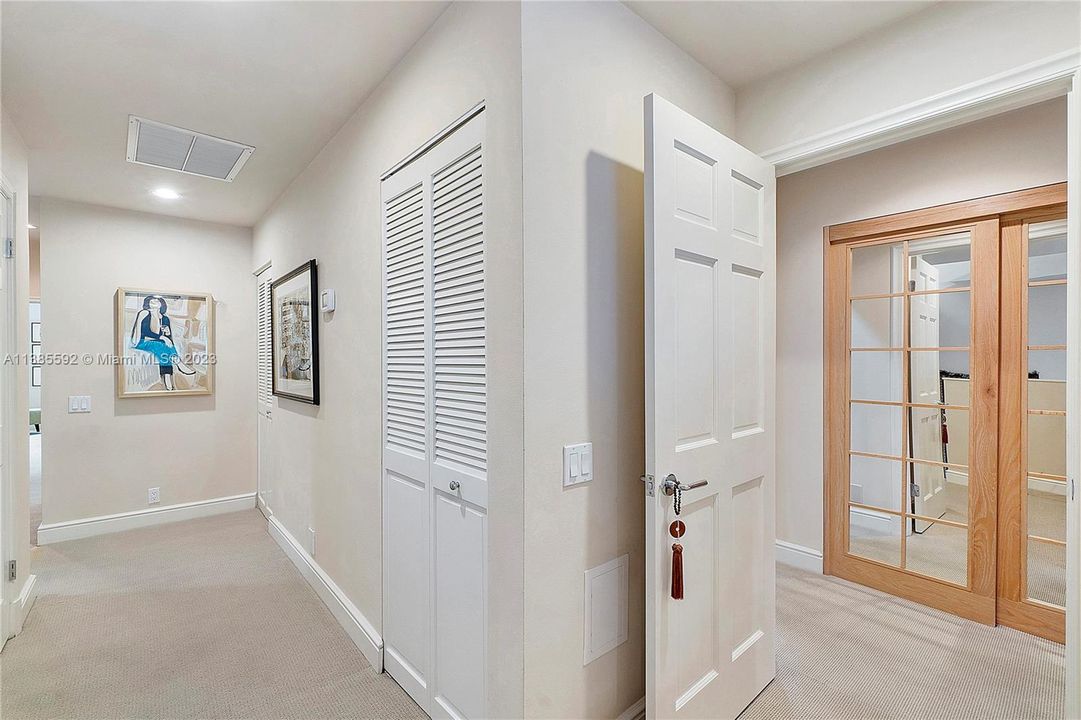 Upstairs Hallway showing entry to Primary Bedroom Suite